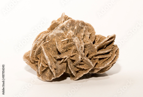 Desert rose (crystal), is an intricate rose formation of crystal clusters gypsum or baryte, which include abundant sand grains.