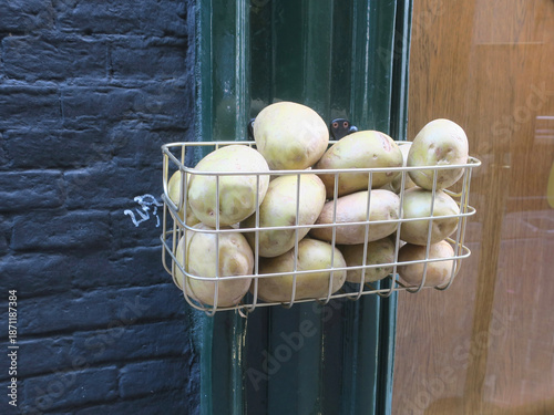 metal basket filled with potatoes