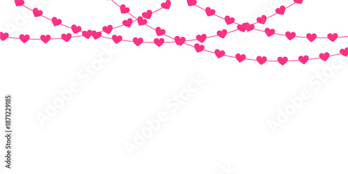 Fotografie Hanging red heart decorations arranged as a seamless Valentine border and romant