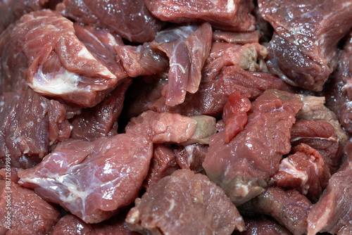 Obraz na płótnie Meat cut into pieces for lunch. Chunks of raw lard on a plate.