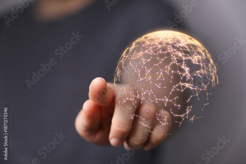 Hand pointing towards illum...