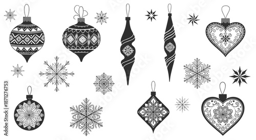 A beautiful set of black and white Christmas ornaments and snowflakes with intricate Scandinavian-style folk art patterns.