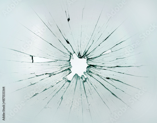 Cracked and shuttered glass with hole
