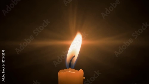 Candle Flame Burning in Dark Room.
