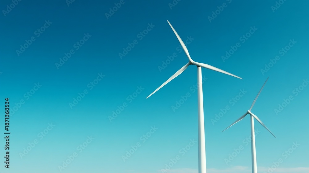 Obraz premium Wind Turbines Against a Clear Blue Sky, green energy, renewable