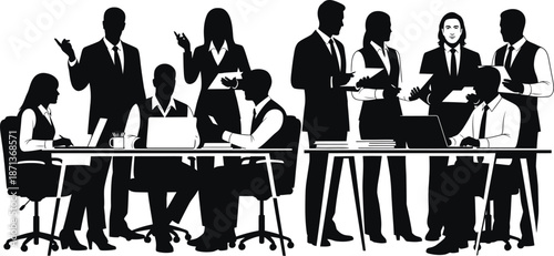 Business professionals collaborating intensely around a shared table during a serious meeting discussing strategy with laptops and documents present