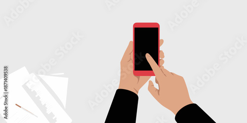 Modern red smartphone in hand using touchscreen for mobile app or website design with office paperwork on desk digital lifestyle communication technology concept for business presentation or marketing