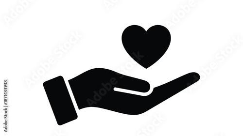A black silhouette of a hand gently offering a heart shaped symbol of love