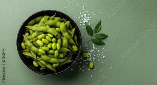 Wallpaper Mural Green Edamame Beans in Black Bowl with Sea Salt on Green Background Torontodigital.ca