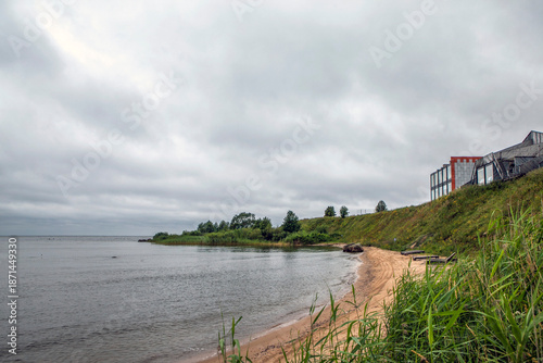 Konstfotografi A deserted beach and the shore of Lake Peipus with cottages and glamping sites