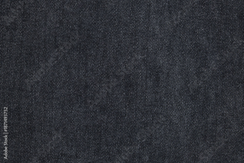 Close up of black jeans fabric texture background.