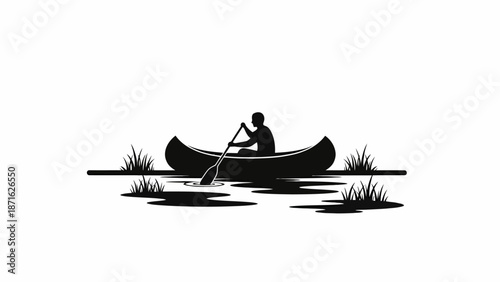Man Paddling Canoe Silhouette on Water.