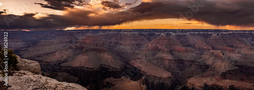 High Dynamic Range Panoramic View of Grand Canyon Storm at Sunset with Rain Shafts