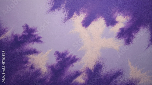 Photos A purple sky with white clouds and trees in the foreground
