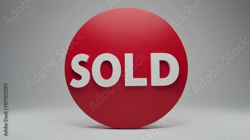 Red Sphere With White Text Sold In Studio Lighting On A Gray Background