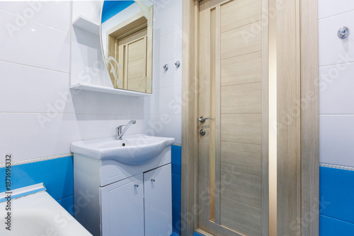 modern bathroom room with toilet and washing machine