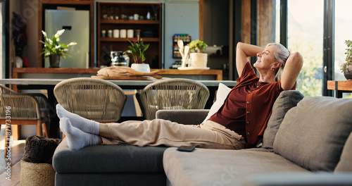Картината върху платно Happy woman, thinking and relax on couch with stretching for peaceful moment, tranquility or daydreaming