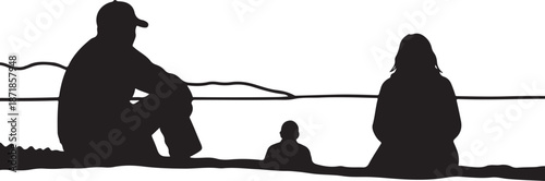 Family Silhouette at Sunset or Dawn by Water