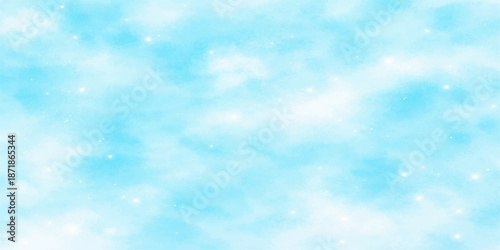 Abstract blue winter sky with fluffy white clouds and sunny bokeh sunlight creates a beautiful bright atmosphere in this clear day nature cloudscape