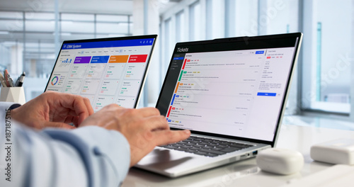 Tableau sur toile Hispanic Computer Technician Improving Website Security