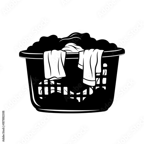 Overflowing laundry basket with clothes spilling over the sides black and white