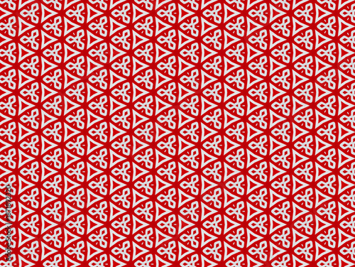 Seamless pattern of red and white geometrical shapes.