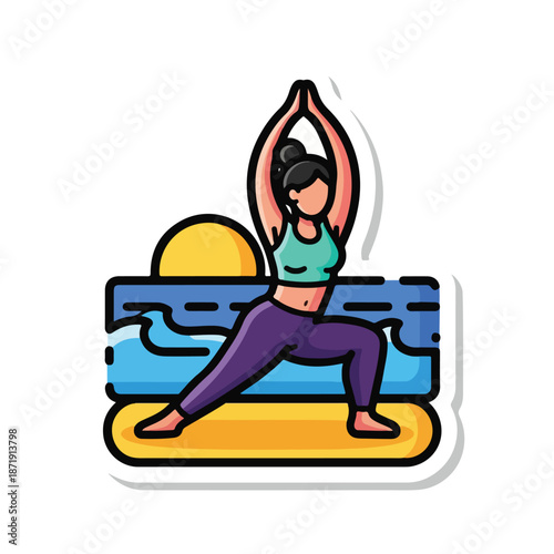 A woman practices yoga on a beach at sunrise