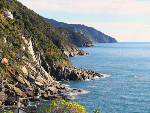 Rocks and sea, Cinque Terre mountains, Italy. Nature and clear blue waters of Mediterranean Sea. Peace and quiet. Vernazza ecology. Background for design.