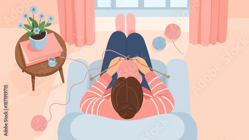 Woman Knitting on Couch: A Cozy and Creative Indoor Activity.