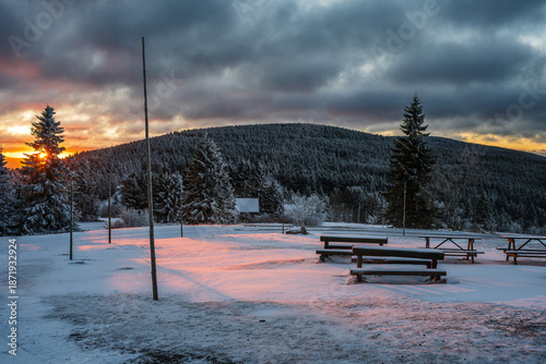 Beautiful sunrise in winter mountain landscape. Orlické hory, Czech Republic.