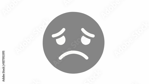 фотографія Grey frowning emoticon face expression symbol.