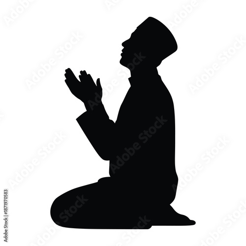 A silhouette of a man kneeling in prayer hands raised in supplication embodying faith and devotion