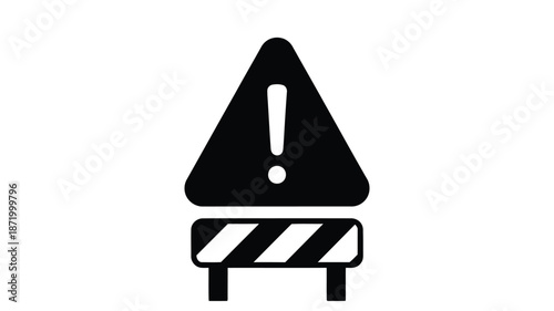 Black and white image of a warning sign with an exclamation point on a barrier