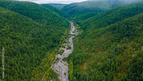 View from above. Mining of loose gold. A river destroyed by gold miners. A developed field in the taiga.