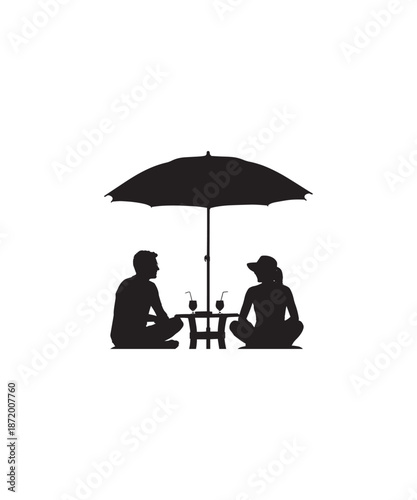 Couple sitting under an umbrella at a table with drinks, silhouette.