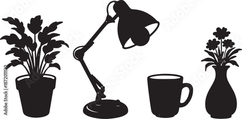 Silhouettes of desk lamp, plants, and coffee cup