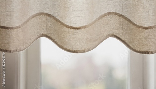 Detailed medium shot showcasing scalloped edge custom window valance fabrics highlighting gentle curves and stitching in soft natural light.
