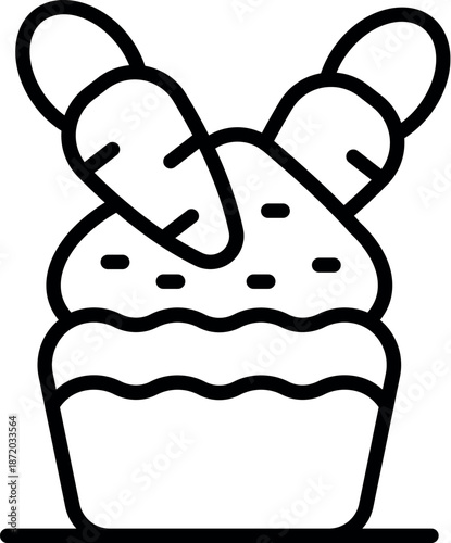 Delicious homemade carrot cake muffin decorated with two marzipan carrots, perfect for an easter celebration