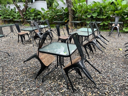Empty Tables and Chairs in Outdoor Cafe