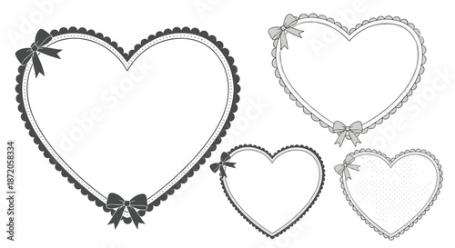Set of four decorative heart shaped frames with scalloped borders and elegant ribbon bows in various gray and black tones for projects.