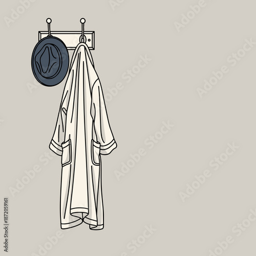 Bathrobe and hat hanging on a hook