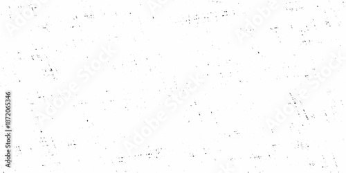 A minimalist white background with subtle texture and scattered granular details