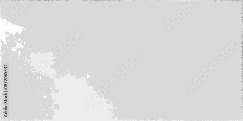 Abstract gray background with scattered white specks and textural variation