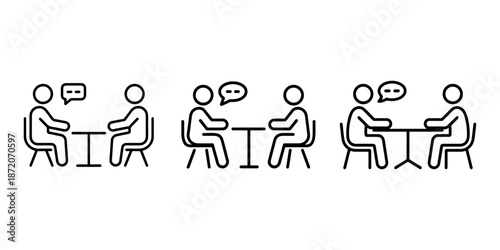 Two people talking at table with speech bubbles, business meeting icon