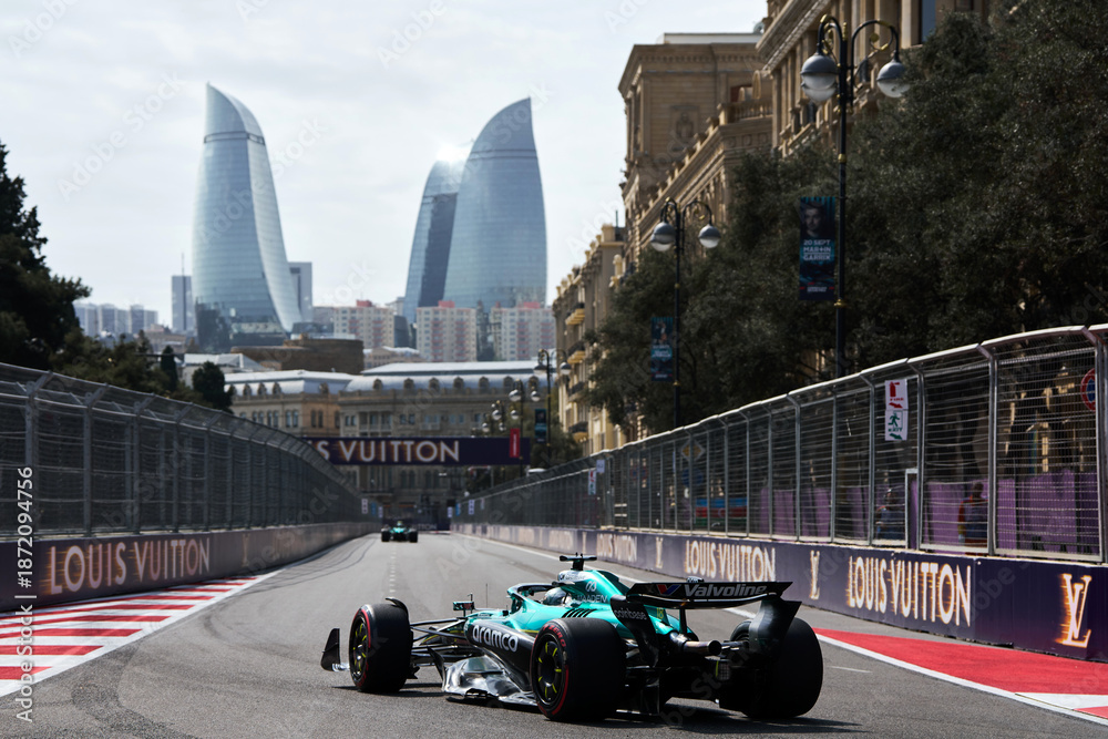 Fototapeta premium BAKU, AZERBAIJAN - SEPTEMBER 19, 2025: Canadian driver Lance Stroll competes in his Aston Martin AMR25 during the Formula 1 Azerbaijan Grand Prix