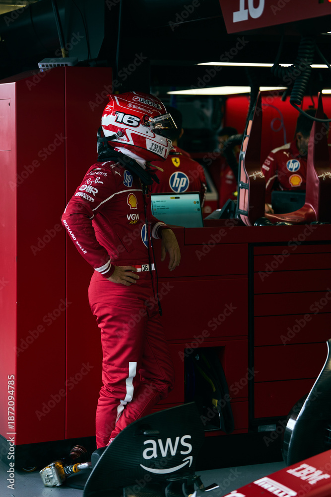 Fototapeta premium BAKU, AZERBAIJAN - SEPTEMBER 19, 2025: Monegasque driver Charles Leclerc stands in the Scuderia Ferrari garage during the Formula 1 Azerbaijan Grand Prix