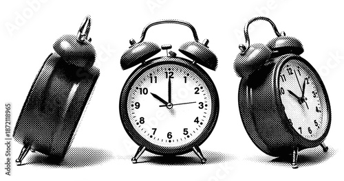 Retro black and white alarm clock trio displaying different times