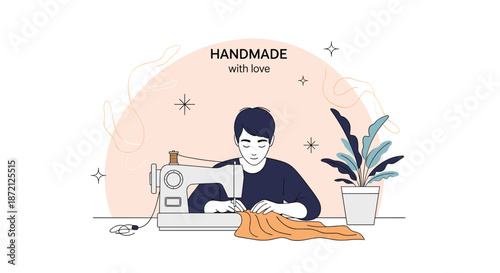 Focused young man using an electric sewing machine to stitch orange fabric on a workbench with a potted plant on a soft pink circular background.