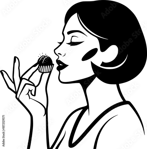 Woman indulges in the exquisite taste of a chocolate truffle in
