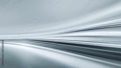 Smooth silver lines create a futuristic, abstract horizon with a sense of movement.